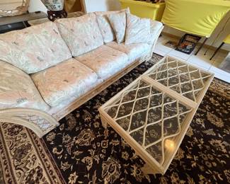 Love the detail on the glass top coffee table.