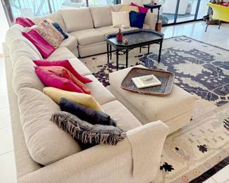 Five-piece living room sectional in a neutral oatmeal color. (More on that Kilim rug later!)