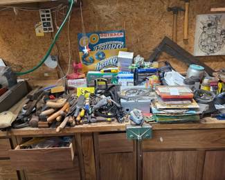 Workbench with hammers, hand tools and hardware