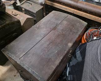 Wood trunks and tool chest in garage