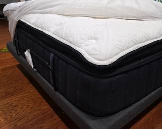 Pillow-top mattress on adjustable-style base with linens