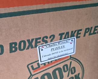 U-Haul box labeled Charles Wysocki puzzles