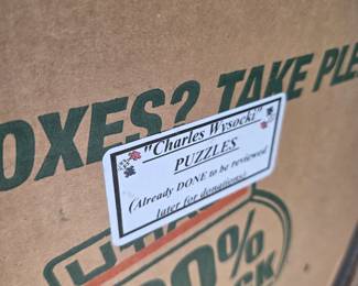 Box labeled Charles Wysocki puzzles