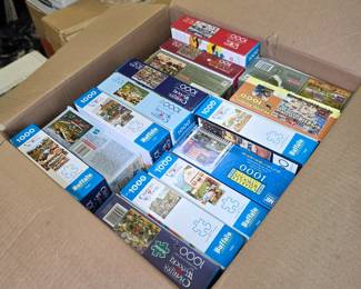 Box of 1000-piece jigsaw puzzles