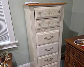 White lingerie chest with painted floral drawers and wood top