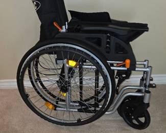 Lightweight folding wheelchair (as-new)