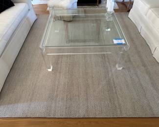 Handwoven Heather Wool rug & lucite coffee table
