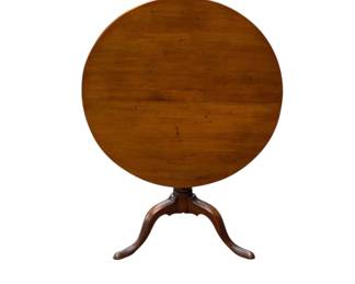 Lot 24: Round Cherry Tilt Top Table 