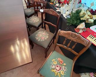 R24 - $250. Georgetown galleries mahogany dropleaf table with eight chair chairs. Fully opened it measures 42" x 74" x 30" tall. With the leaves down it is only 26.5" wide. Very good vintage condition. Has a storage drawer on either side that slide easily.