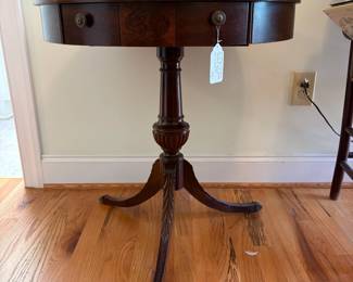 R38 - $75. Mersman brothers drum table. Model 7225. Measures 25" across x 26.5" tall. Single drawer slides easily. Very good vintage condition. 