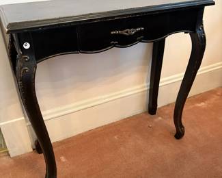 R25 -  $30. Small Black side table. Measures 32" x 13" x 30.5" tall. Has single drawer that slides. 