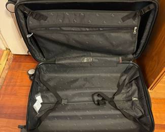 R12 -  $50. Heys 4 spinning wheel luggage. Measures 17" x 10" x 28" tall. Zippers work - clean inside. 