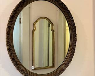 R14 - $35. Oval wooden framed mirror. Measures 23" x 27". Very good vintage condition.