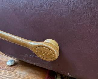 R31 - $100. Brown leather La-Z-Boy rocking recliner. Very good condition. No holes or rips noted. Measures 33" x 36" x 39" tall. 