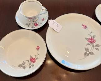 R28 - $60. Enchanted Rose Fine China by Lennold. Service for 10 with a few serving pieces. Very good condition. 