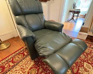  R30 - $100. La-Z-Boy rocker recliner in green leather.  Good condition, no holes or rips noted.  Measures 33" x 36" x 39" tall. 