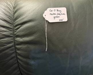  R30 - $100. La-Z-Boy rocker recliner in green leather.  Good condition, no holes or rips noted.  Measures 33" x 36" x 39" tall. 