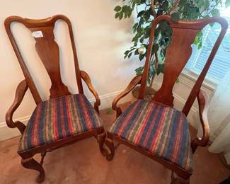 R26 - $40. Pair of arm chairs with upholstered seats. Measures 22" wide x 19" deep x 43" tall. 