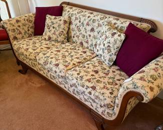 R17 - $75. Floral upholstered sofa. Measures 83" x 29" x 33".  