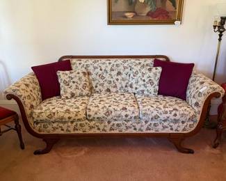 R17 - $75. Floral upholstered sofa. Measures 83" x 29" x 33".  