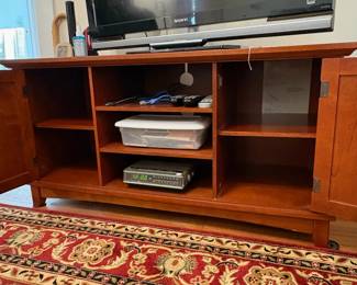 R36 - $40. Media stand. Measures 48" x 18.5" x 24" tall. Very sturdy gently used condition. 