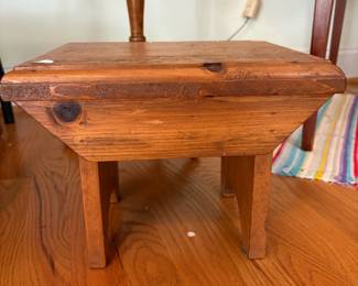 R41 - $20. Small wooden stool with chicken carved in the top. Measures 12" x 10" x 9.5" tall. 