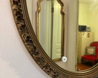 R14 - $35. Oval wooden framed mirror. Measures 23" x 27". Very good vintage condition.
