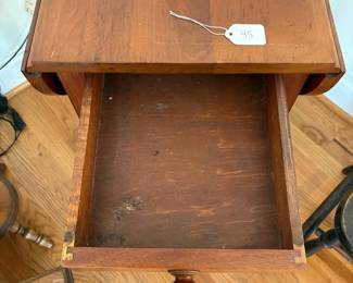 R40 - $45. Single drawer, small wooden drop leaf table. Solid wood. Measures 30.5" x 25" x 26.5" tall. Leaves down it is 14" wide. 