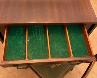 R24 - $250. Georgetown galleries mahogany dropleaf table with eight chair chairs. Fully opened it measures 42" x 74" x 30" tall. With the leaves down it is only 26.5" wide. Very good vintage condition. Has a storage drawer on either side that slide easily.