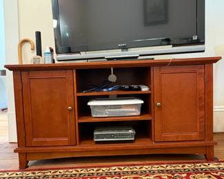 R36 - $40. Media stand. Measures 48" x 18.5" x 24" tall. Very sturdy gently used condition. 