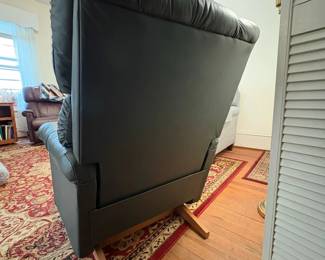  R30 - $100. La-Z-Boy rocker recliner in green leather.  Good condition, no holes or rips noted.  Measures 33" x 36" x 39" tall. 
