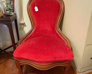 R7 -  $65. Red velour upholstered chair. Frame is solid upholstery is in very good condition. 