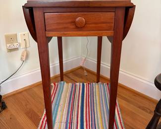 R40 - $45. Single drawer, small wooden drop leaf table. Solid wood. Measures 30.5" x 25" x 26.5" tall. Leaves down it is 14" wide. 