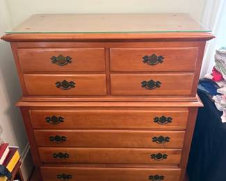 R1 - $150. Link Taylor, eight drawer chest of drawers. Measures 42" x 19" x 49" tall. Has a glass top to protect.  All drawers slide - very good condition.