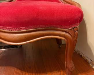 R7 -  $65. Red velour upholstered chair. Frame is solid upholstery is in very good condition. 