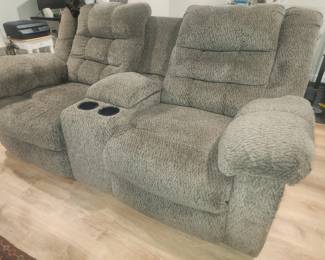 Reclining loveseat with console