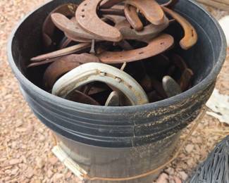 Lot 325 Collection of Vintage Rusted Metal Horseshoes in Plastic Bucket