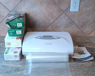 Lot 091 SealaMeal Vacuum Food Sealer with FoodSaver Storage Bags Instruction Manual
