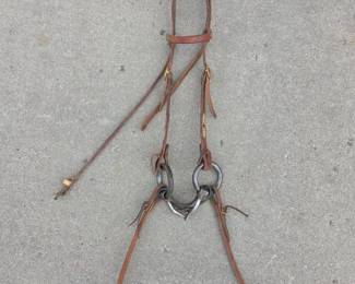 Lot 302 Schutz Bros Leather Horse Bridle with Loose Ring Snaffle and Long Narrow Straight Reins