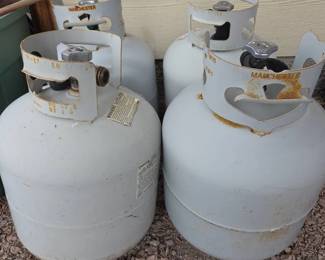 Lot 322 Set of Four Grey Steel Propane Gas Cylinders with Valves and Safety Labels