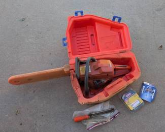 Lot 213 Husqvarna 55 Gas Chainsaw with Carrying Case, 20 Replacement Chains Sharpening Tool