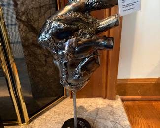 welded cast metal human heart sculpture