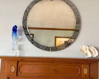 large round mirror with mottled silver frame