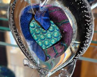 several blown glass hearts