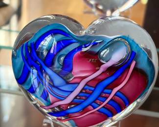 several blown glass hearts