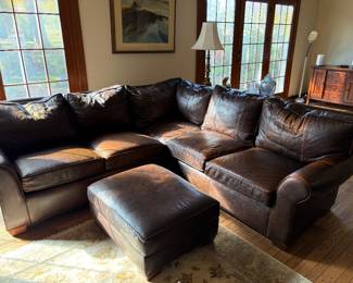 Brown Leather 2 pc sectional sofa with ottoman – Cambridge Collection. Feather and down cushions, wood block feet. 93.5l x 39d x 32h, 54l x 39d x 32h