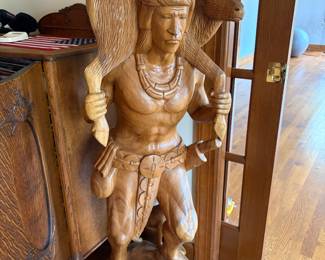 large carved wood statue of Native American hunter with deer - about 4ft tall