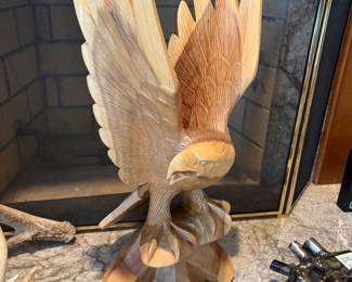 carved wood bird of prey sculpture