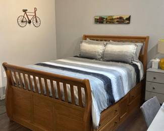 Slatted sleigh bed with under bed storage on both sides 