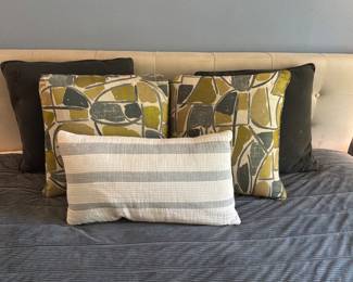 Lots of decorative throw pillows 